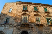 The Palazzo de Lerma nearby the cathedral, a tribune for the theatre that is the daily life in the main square.