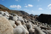 A beach of giant stones.