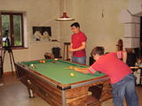 Relaxing in the billiard room, after the event.