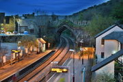 The night falling on the train station, that also has its share of medieval walls.