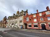 Crewe's highlight: the municipal buildings. The market on the left is operating.