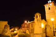 At night, wich chimneys and towers.