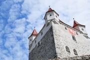 The castle tower in the Bavarian white and blue sky.