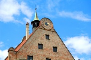 The clock atop the main entrance.