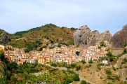 Huddling itself between rocks and a mountain, the village of Castelmezzano.