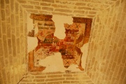Remains of a blazon on the ceiling.